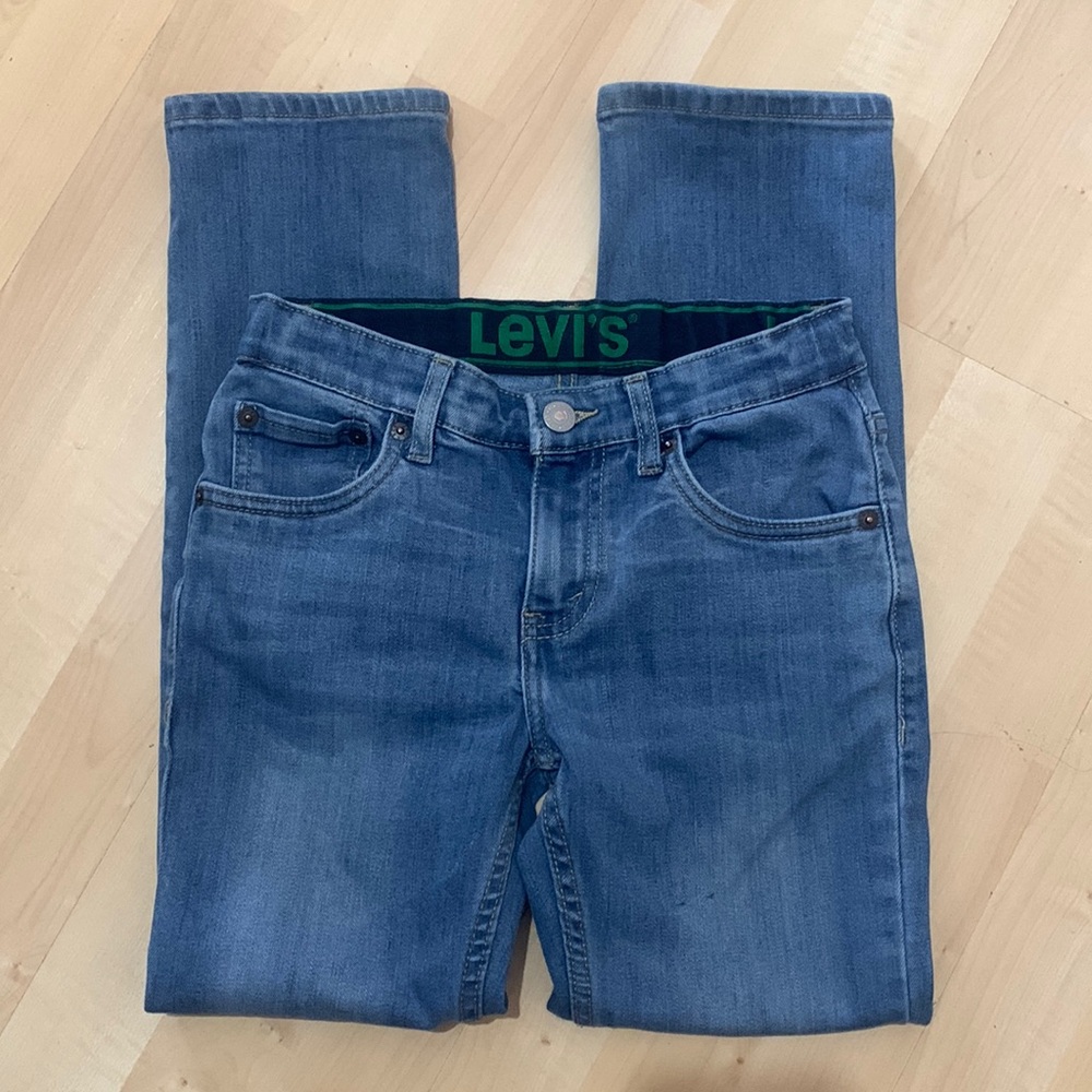 Levi’s 511  for your kiddo.  Faded blue wash adjustable waist